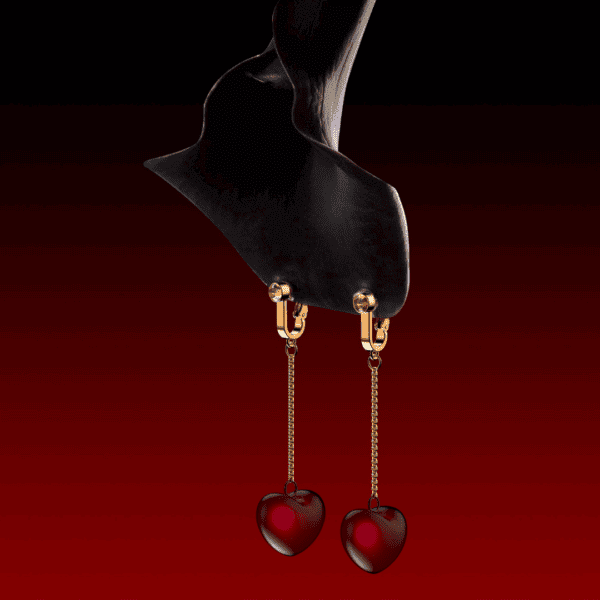 Schwarze, auf dem Kopf stehende Blume, an der klitoraler Glockenschmuck mit herzförmigen Kirschen hängt.
