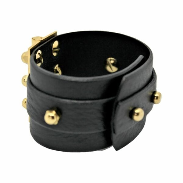 Packshot sur fond blanc du bracelet Twin Strap Hinge en cuir noir.