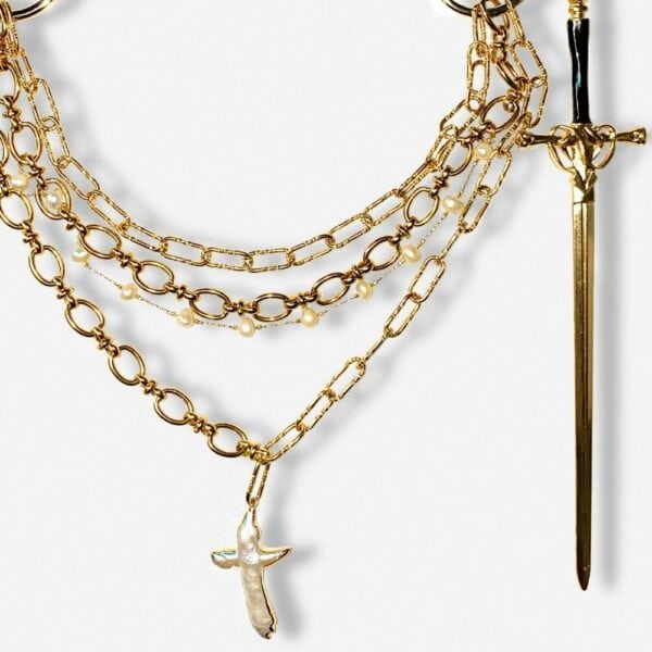 Detail of Packshot of a Gold Chain Belt with Pearls and Charms