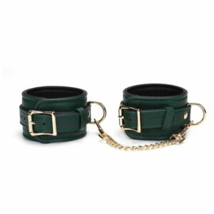 Packshot of Mossy Chic Leather Ankle Cuffs in Green and Black