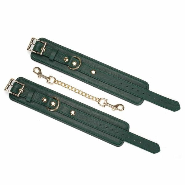 Packshot of Mossy Chic Ankle Cuffs in Green and Black Flat Leather