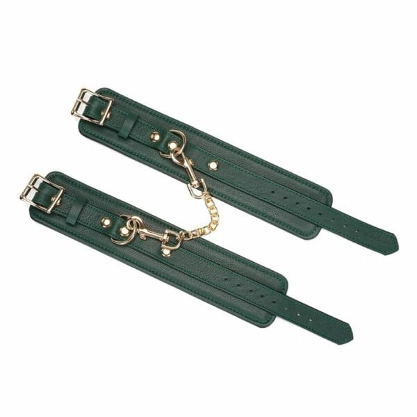 Packshot of Mossy Chic Ankle Cuffs in Green and Black Flat Leather