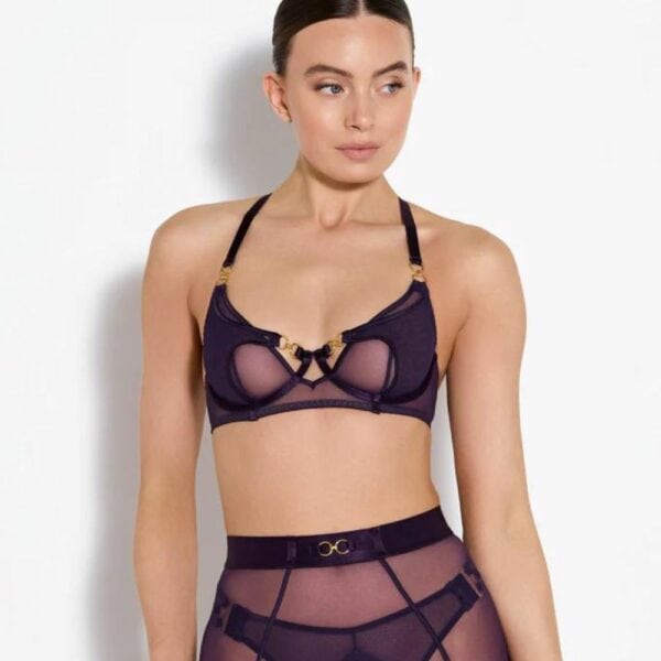 Photo of a Front Woman wearing a Violet Fishnet Balconette Bra, Fishnet Skirt and Multi-Strap Fishnet G-string.