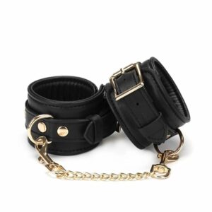 Black Leather Handcuffs with Gold Chain Packshot