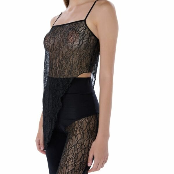 Detail of a Woman 3/4 Wearing Asymmetrical Lace Top and Asymmetrical Lace High Waisted Pants in Black