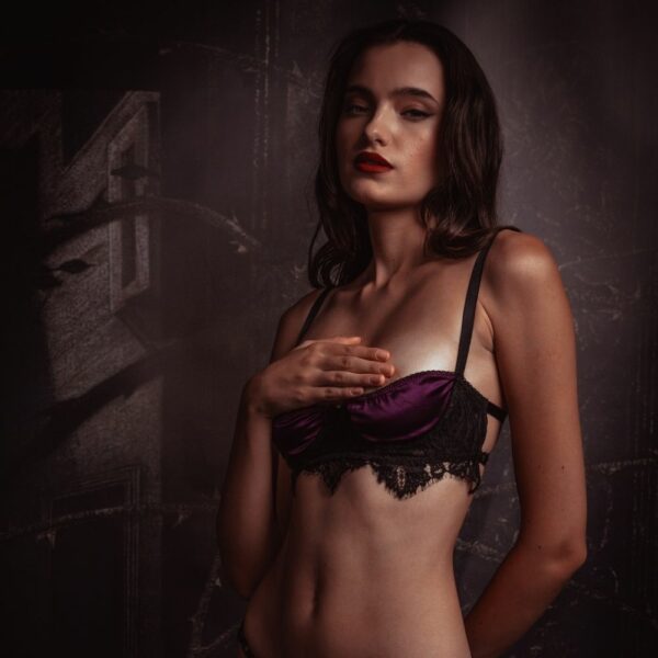 Detail of a 3/4-Length Woman Wearing a Triangle Bra and Open Panties in Violet Satin and Black Lace