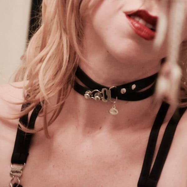 Black leather strap/Choker sold by Brigade Mondaine.