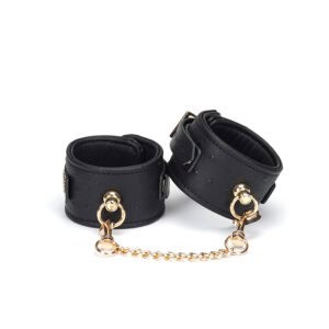 Packshot Black Leather Handcuffs with Gold Chain